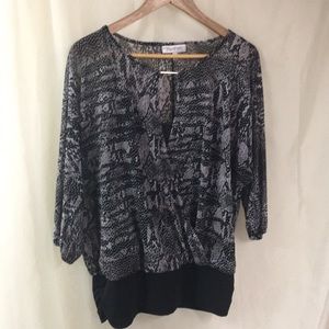 Jennifer Lopez black and grey blouse